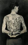 (TATTOO) A finely lit pair of real photo postcard portraits depicting a tattooed mans torso, both front and back.